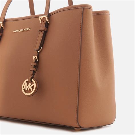 michael kors travel tote medium bag|Michael Kors large suitcase.